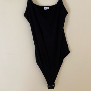 Two bodysuits from Garage.